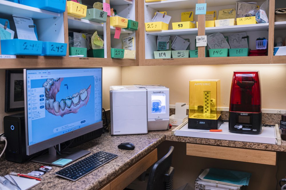Advanced Digital Dental Lab Equipment – Dentist in Naples, FL A high-tech dental lab workspace featuring 3D printing and CAD/CAM equipment for digital dentistry and custom restorations – Dentist in Naples, FL